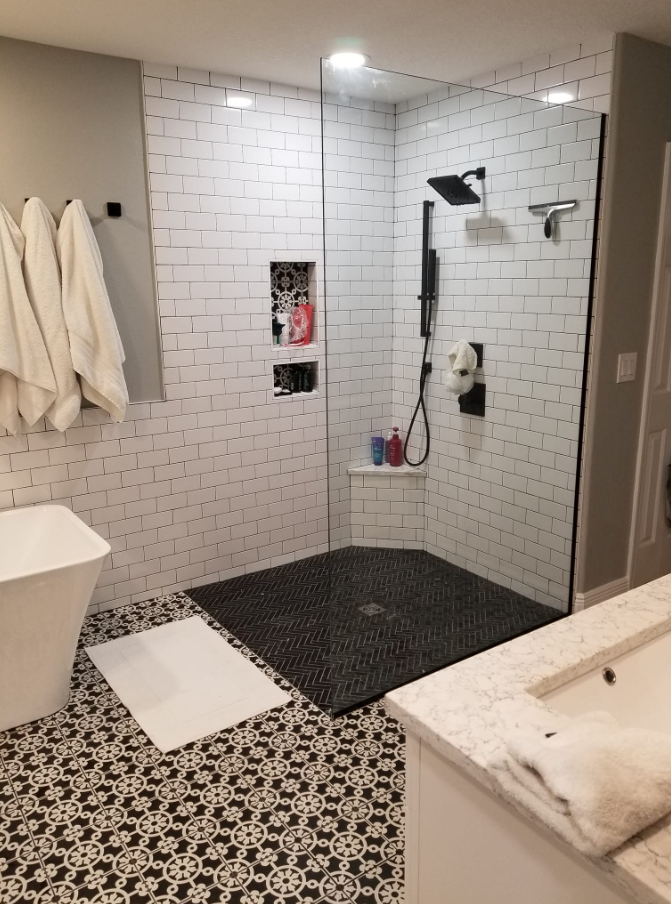 Bathroom with black and white tile